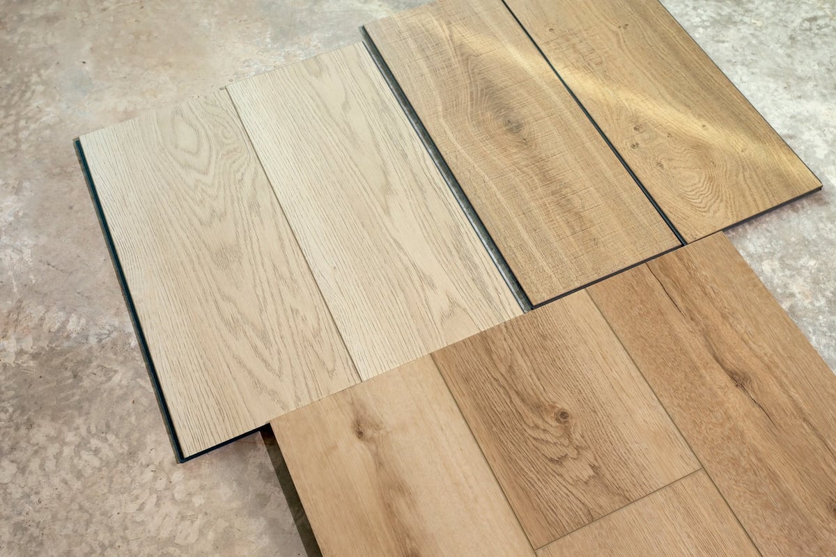 Luxury vinyl wood samples on concrete floor for selection