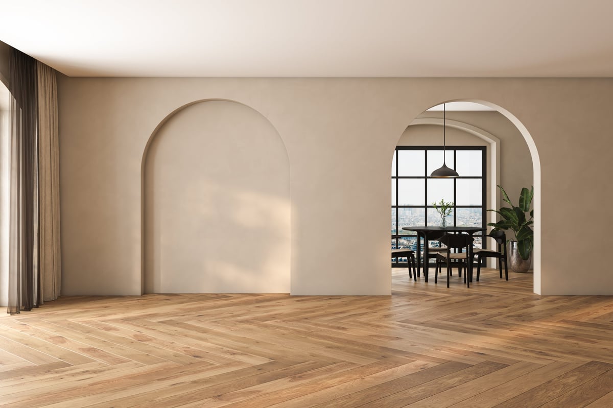 Modern interior with arched wall and vinyl flooring